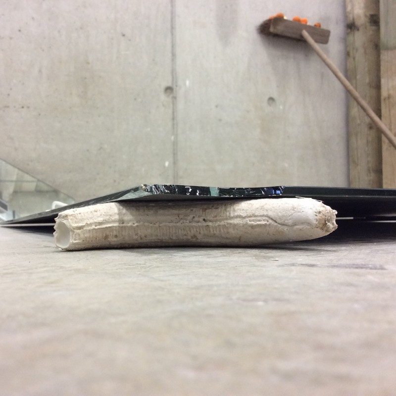 Test install for talk week. Plaster banana cast, broken mirror, 2015
