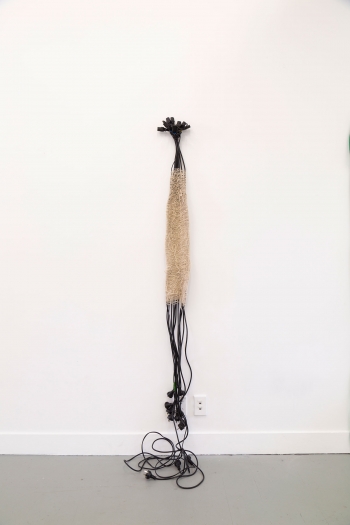 a woven work by Karen Rubado - extended embrace
